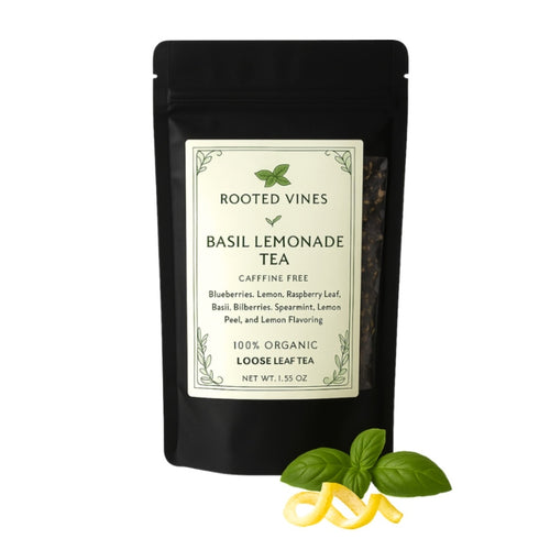 Tea package labeled 'Rooted Vines Basil Lemonade Tea' with a basil leaf and lemon peel on a white background.