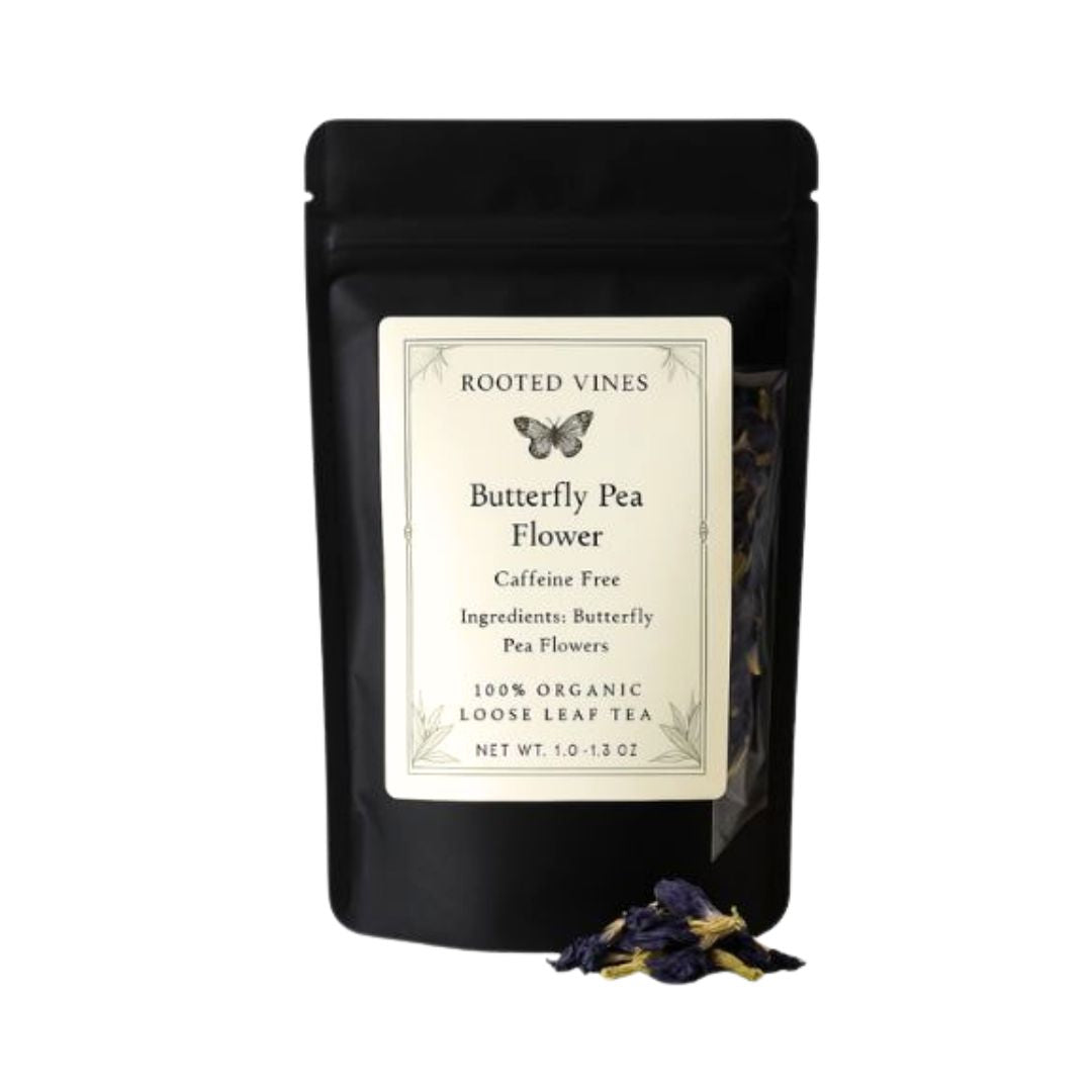 Black package of Rooted Vines Butterfly Pea Flower tea with butterfly graphic on a white background