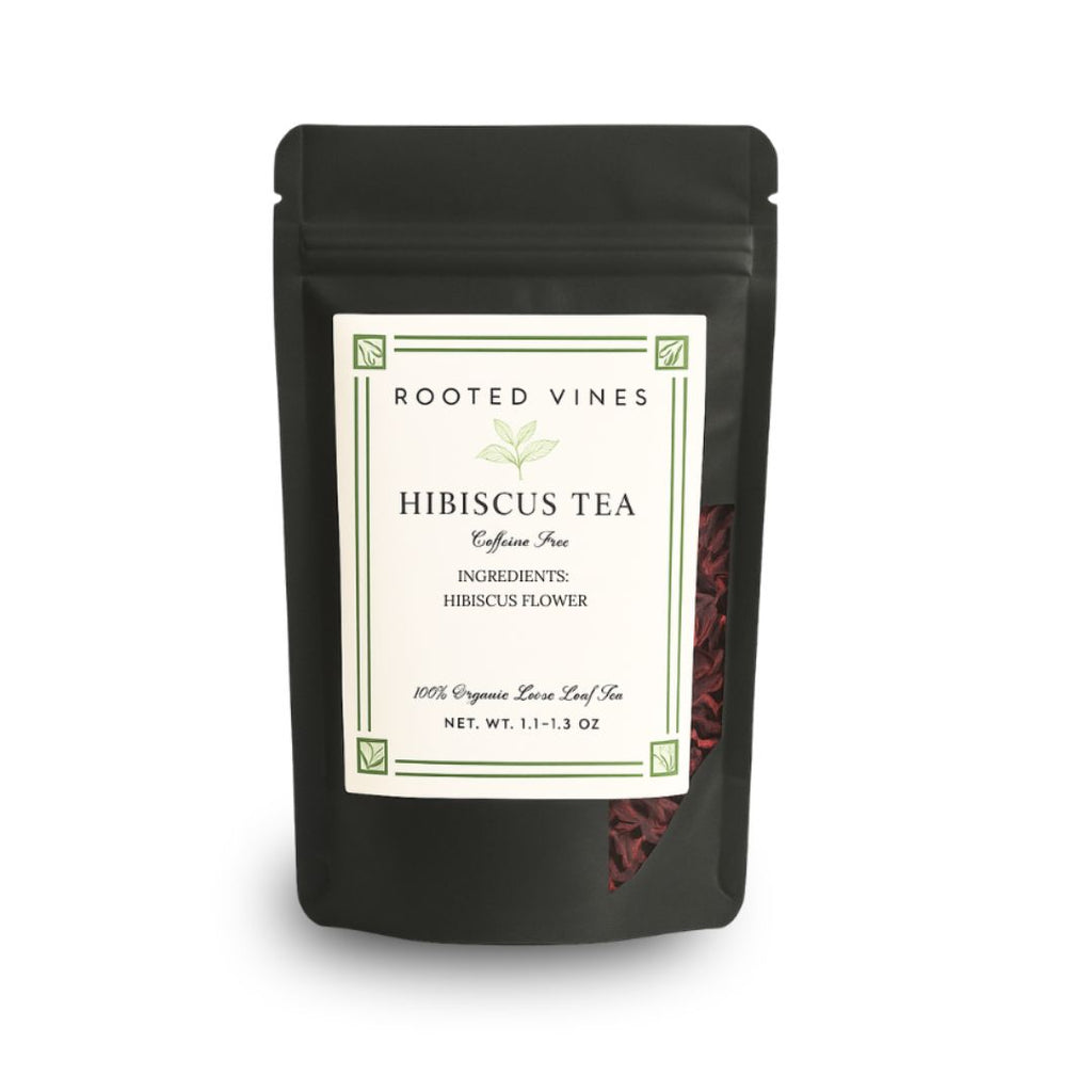 Black package of Rooted Vines Hibiscus Tea on a white background