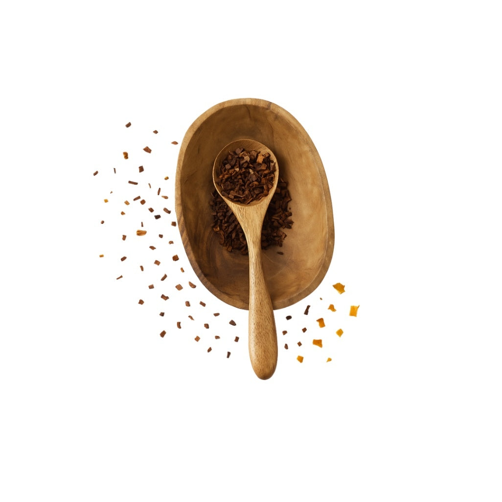 Wooden spoon and bowl with spices on a white background