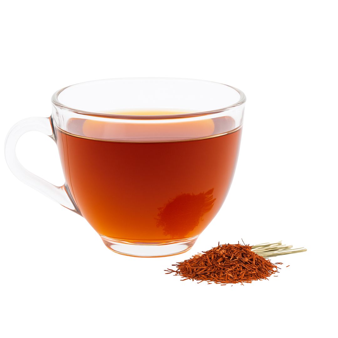 Clear glass mug filled with honeybush tea next to a pile of dried tea leaves on a white background