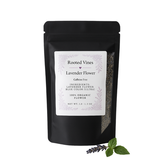 Black package of Rooted Vines Lavender Flower tea with a sprig of lavender on a white background