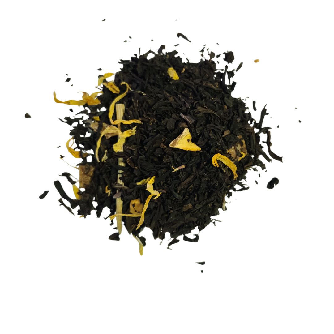 Black tea leaves with yellow elements on a white background