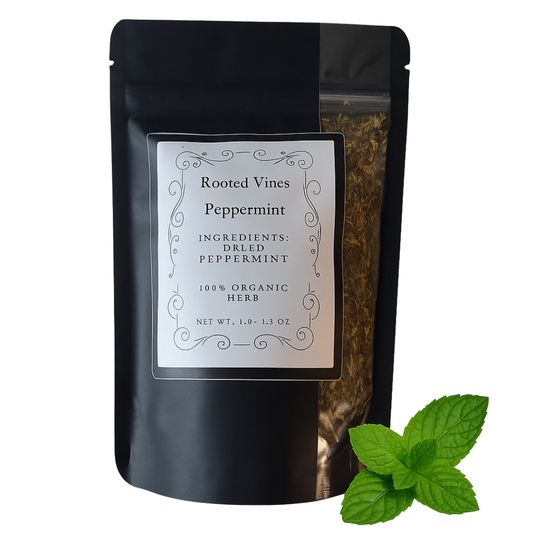 Black package of Rooted Vines Peppermint with a label and mint leaves on a white background