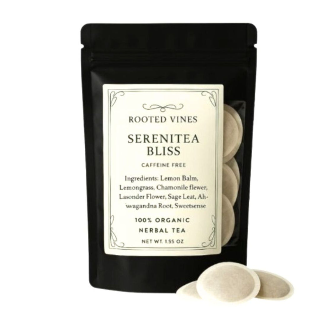 Black package of 'Serenitea Bliss' herbal tea with a white label on a white background