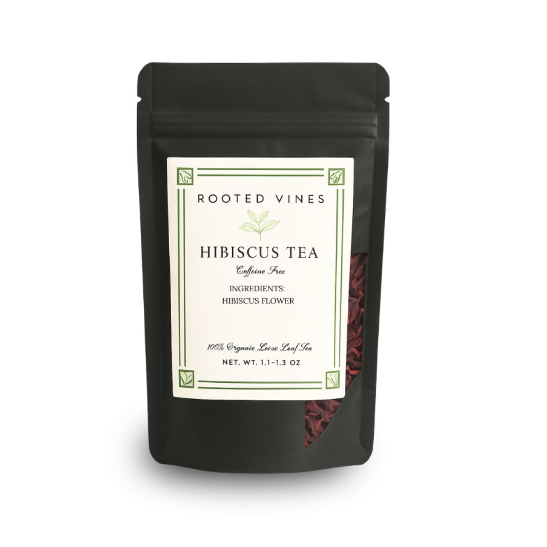 Black package of Rooted Vines Hibiscus Tea on a white background