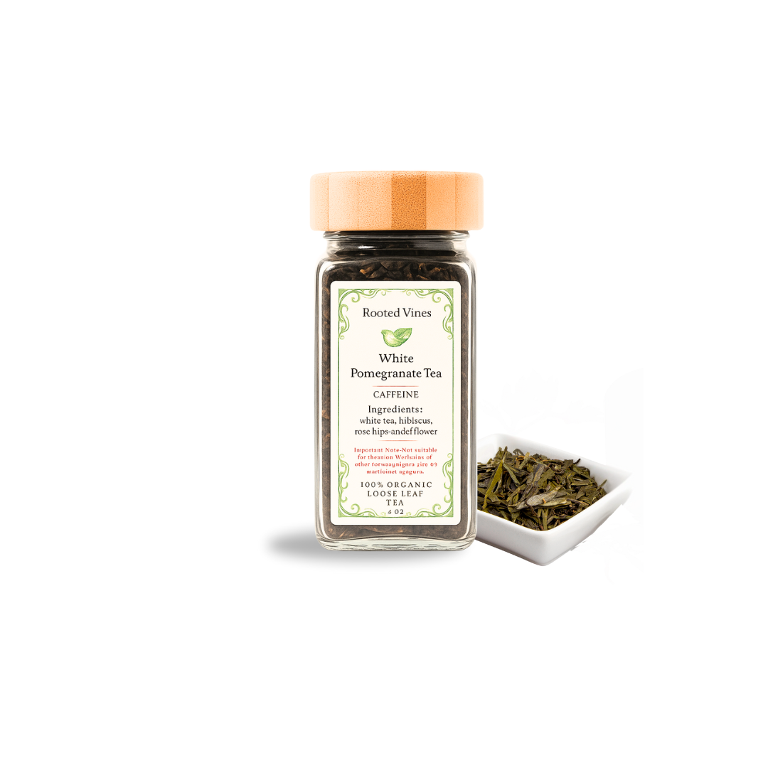 Tea jar with a lid, white pomegranate tea packaging, and a small dish of tea leaves on a white background.