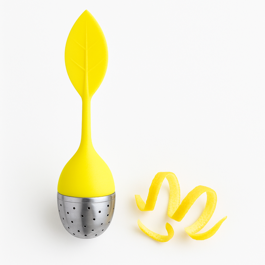 Yellow tea infuser with a silver mesh ball on a white background