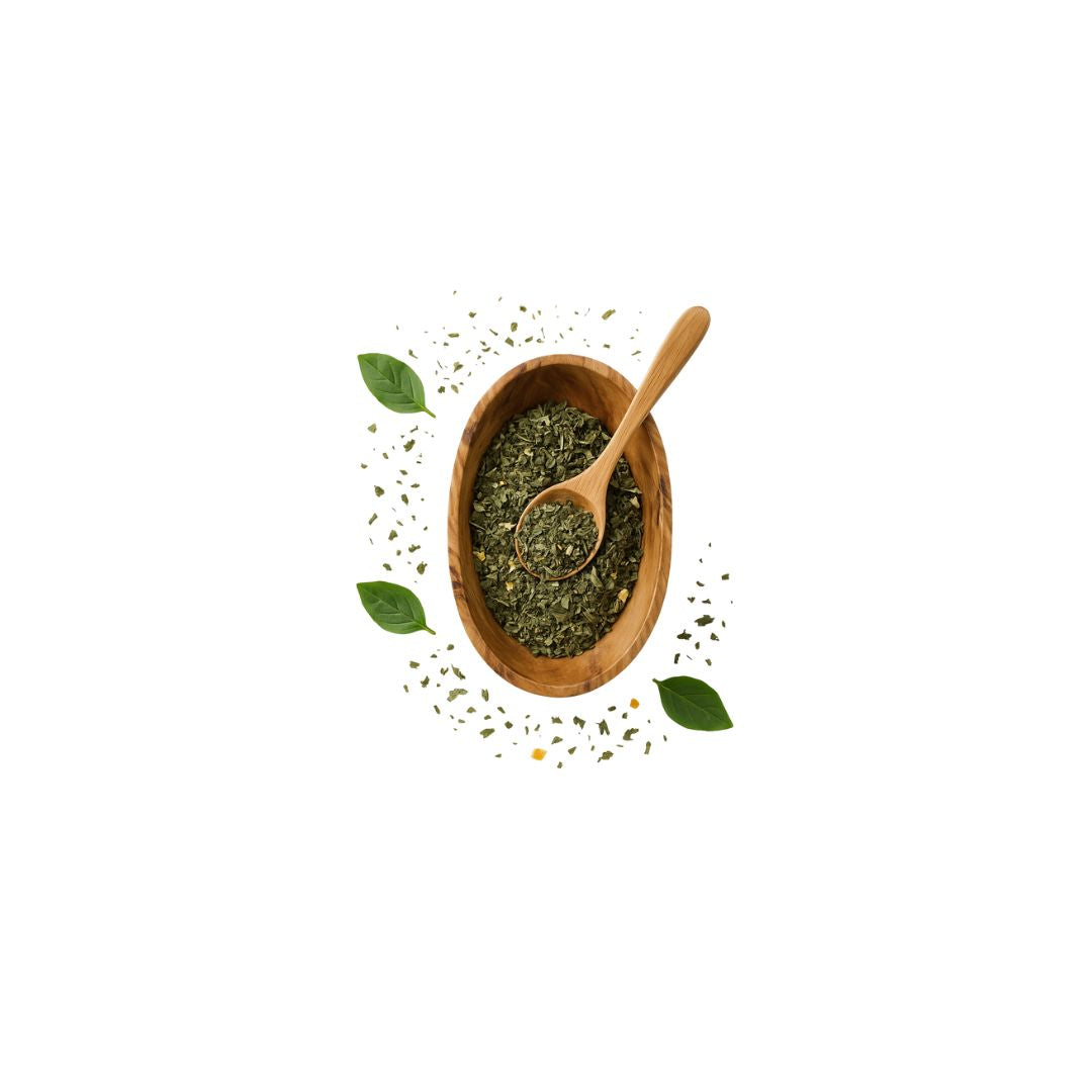 Wooden bowl with dried herbs and a wooden spoon on a white background