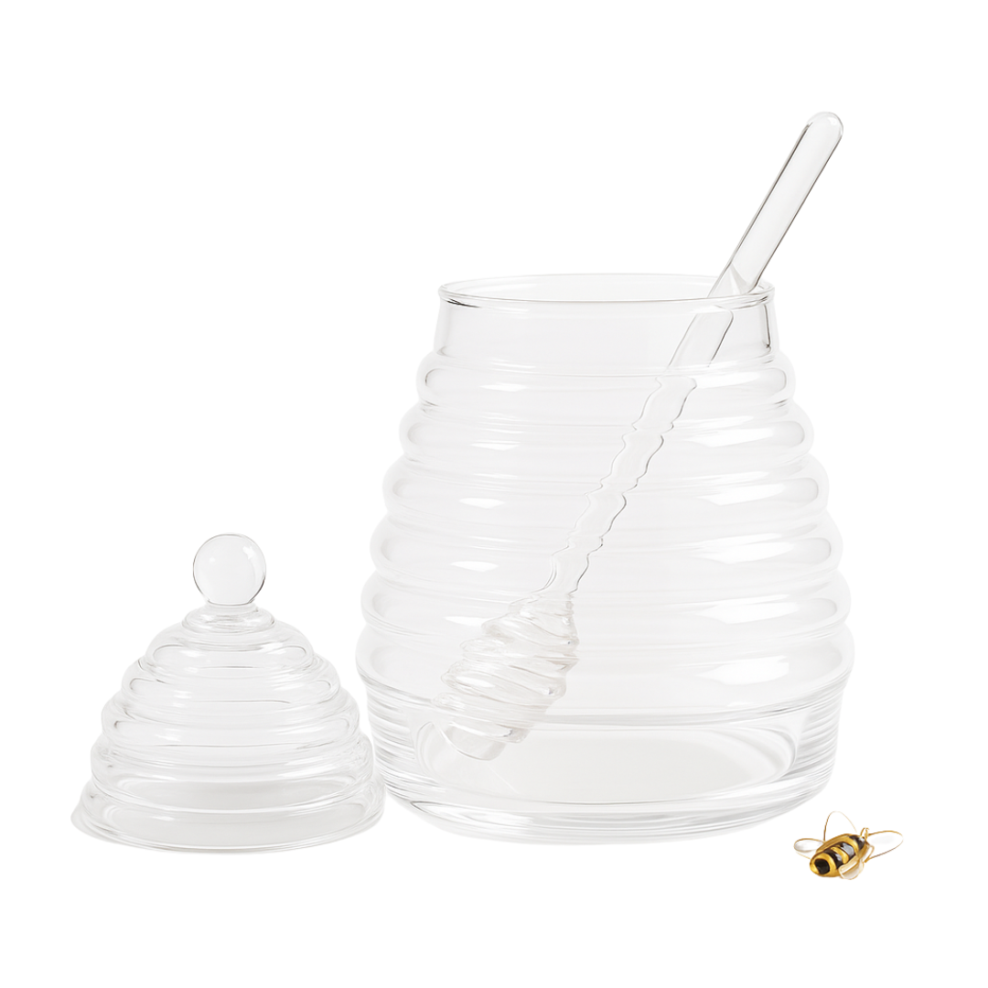 Clear glass honeycomb design jar with a lid and spoon on a white background