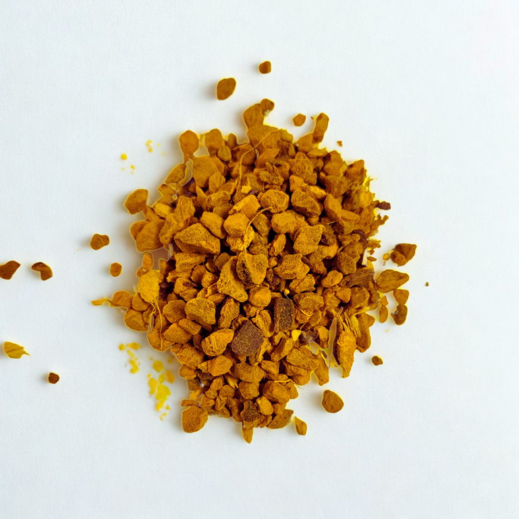 Turmeric powder on a white background