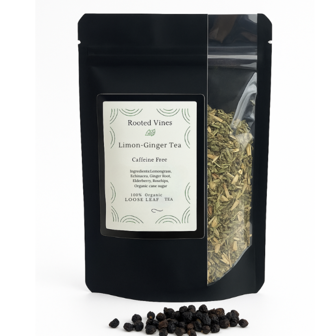 Black tea packaging with 'Rooted Vines' label and loose leaf tea visible